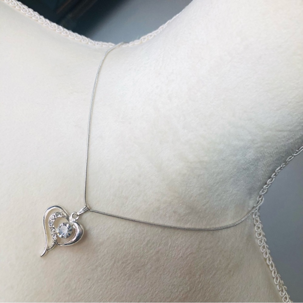 Vintage clear faceted stone heart pendant on chain necklace